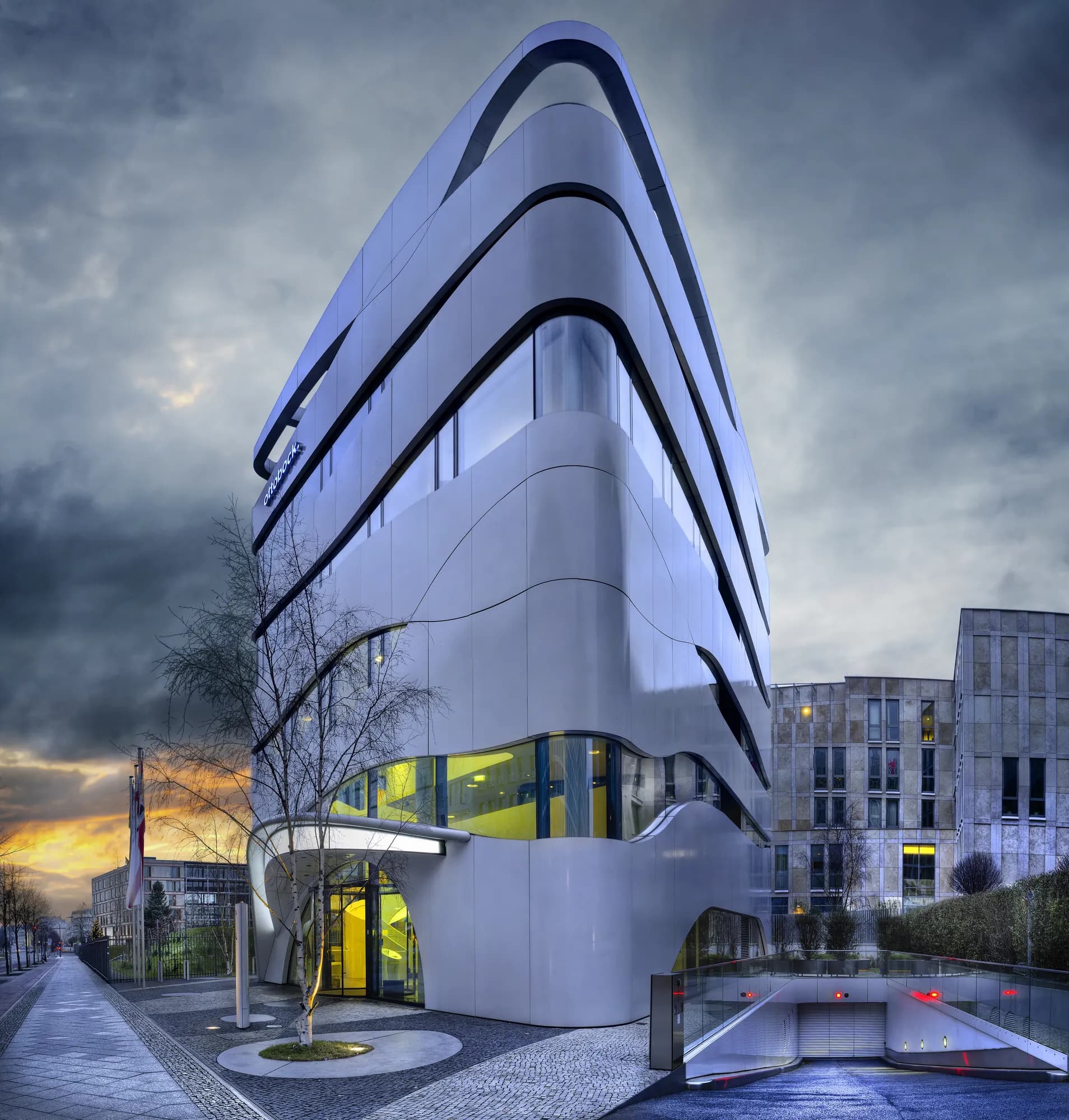 Modern building facade with curved walls and geometric windows